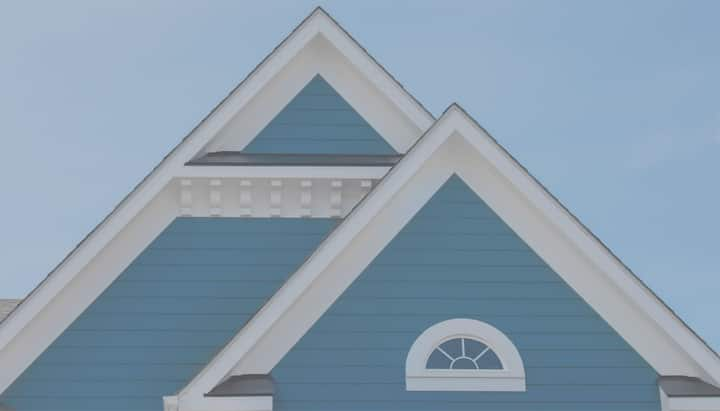 Blue siding installed on a farm house in Birmingham, AL.